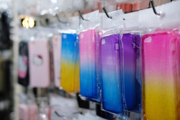 A retail display of colorful, uniquely designed phone cases created using 3D printing. Each case features a different texture, pattern, and color scheme.