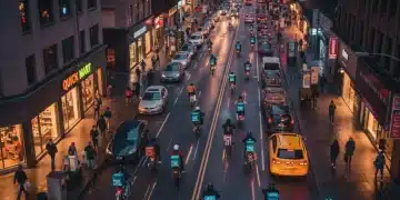 Quick commerce delivery riders navigating a bustling city street at dusk, emphasizing speed and efficiency.
